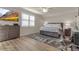 Bedroom with king-size bed, dresser, and home office space at 12550 Ghiberti Cir # 101, Venice, FL 34293