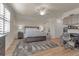 Main bedroom with king bed, and built-in home office at 12550 Ghiberti Cir # 101, Venice, FL 34293