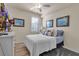 Bright bedroom with a comfortable bed and plenty of natural light at 12550 Ghiberti Cir # 101, Venice, FL 34293