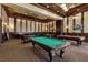 Community room with billiard tables and card tables at 12550 Ghiberti Cir # 101, Venice, FL 34293