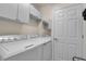 Convenient laundry room with washer and dryer at 12550 Ghiberti Cir # 101, Venice, FL 34293