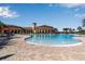 Large resort-style pool with plenty of lounge chairs at 12550 Ghiberti Cir # 101, Venice, FL 34293