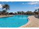 Large resort-style pool with plenty of lounge chairs at 12550 Ghiberti Cir # 101, Venice, FL 34293