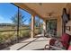 Spacious screened lanai overlooking a pond and community at 12550 Ghiberti Cir # 101, Venice, FL 34293