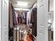 Walk-in closet with shelving, drawers, and hanging space at 12550 Ghiberti Cir # 101, Venice, FL 34293