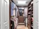 Large walk-in closet with ample shelving and hanging space at 12550 Ghiberti Cir # 101, Venice, FL 34293