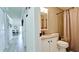 Clean bathroom with granite countertop and updated fixtures at 1737 Bonitas Cir # 1724D, Venice, FL 34293