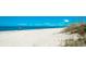 Scenic beach view with white sand and blue water at 1737 Bonitas Cir # 1724D, Venice, FL 34293