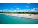 Expansive beach view with turquoise water and white sand at 1737 Bonitas Cir # 1724D, Venice, FL 34293