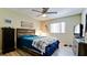 Bright bedroom with a comfortable bed and plenty of closet space at 1737 Bonitas Cir # 1724D, Venice, FL 34293
