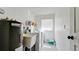 Laundry room with washer, dryer, and utility sink at 1737 Bonitas Cir # 1724D, Venice, FL 34293
