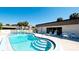Inviting community pool with lounge chairs for relaxing at 1737 Bonitas Cir # 1724D, Venice, FL 34293