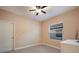 Simple bedroom with window and neutral decor at 176 Avens Dr, Nokomis, FL 34275