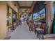 Relaxing outdoor cafe with shaded seating and inviting atmosphere at 176 Avens Dr, Nokomis, FL 34275