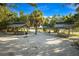 Scenic picnic area with shaded tables and grills at 176 Avens Dr, Nokomis, FL 34275