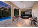 Relaxing screened pool area with patio furniture at 176 Avens Dr, Nokomis, FL 34275