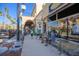 Charming streetside cafe with outdoor seating and people enjoying coffee at 176 Avens Dr, Nokomis, FL 34275