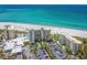 Aerial of beachfront condos with parking and ocean views at 250 Sands Point Rd # 5105, Longboat Key, FL 34228