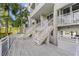 Shared balcony with access to outdoor seating and landscaping at 250 Sands Point Rd # 5105, Longboat Key, FL 34228