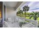 Relaxing balcony with outdoor seating and scenic views at 250 Sands Point Rd # 5105, Longboat Key, FL 34228