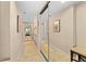 Bright bathroom with double vanity and mirrored closet at 250 Sands Point Rd # 5105, Longboat Key, FL 34228