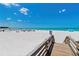 Wooden steps leading to the beach at 250 Sands Point Rd # 5105, Longboat Key, FL 34228