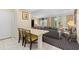 Small dining area with seating for four and access to the living room at 250 Sands Point Rd # 5105, Longboat Key, FL 34228