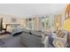 Spacious main bedroom with sitting area and access to the balcony at 250 Sands Point Rd # 5105, Longboat Key, FL 34228