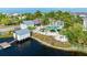 Aerial view of community pool and waterfront at 326 Compass Point Dr # 201, Bradenton, FL 34209