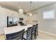 Modern kitchen with stainless steel appliances and white cabinets at 326 Compass Point Dr # 201, Bradenton, FL 34209