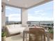 Enjoy waterfront views from this relaxing balcony with seating at 33 S Palm Ave # 1601, Sarasota, FL 34236