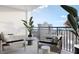 Spacious balcony with comfortable seating and city views at 33 S Palm Ave # 1601, Sarasota, FL 34236