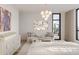 Bright bedroom with a comfortable bed and seating area at 33 S Palm Ave # 1601, Sarasota, FL 34236