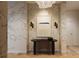 Elegant entryway with statement wallpaper and modern console table at 33 S Palm Ave # 1601, Sarasota, FL 34236