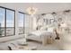Spacious main bedroom with large windows, city views, and a statement wall at 33 S Palm Ave # 1601, Sarasota, FL 34236