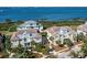Aerial view showcasing a charming waterfront home with a private walkway at 330 Compass Point Dr # 101, Bradenton, FL 34209