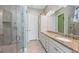 Spa-like bathroom with double vanity and large shower at 330 Compass Point Dr # 101, Bradenton, FL 34209