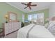 Serene bedroom with king bed, dresser and window with shutters at 330 Compass Point Dr # 101, Bradenton, FL 34209