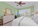 Serene bedroom with king bed, dresser and large window at 330 Compass Point Dr # 101, Bradenton, FL 34209