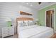 Bedroom with king-size bed and en-suite bathroom at 330 Compass Point Dr # 101, Bradenton, FL 34209