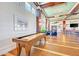 Clubhouse game room with shuffleboard table at 330 Compass Point Dr # 101, Bradenton, FL 34209