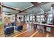 Community room with bar, seating, and pool table at 330 Compass Point Dr # 101, Bradenton, FL 34209