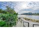 Relaxing fire pit area with waterfront views at 330 Compass Point Dr # 101, Bradenton, FL 34209