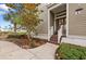 Inviting front entrance with steps leading up to the front door at 330 Compass Point Dr # 101, Bradenton, FL 34209