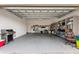 Organized garage with ample storage shelving and a workspace at 330 Compass Point Dr # 101, Bradenton, FL 34209