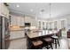 Well-equipped kitchen featuring granite countertops, an island, and stylish cabinetry at 330 Compass Point Dr # 101, Bradenton, FL 34209