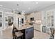 Modern kitchen with granite island, stainless steel appliances, and ample cabinet space at 330 Compass Point Dr # 101, Bradenton, FL 34209