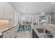 Bright kitchen features granite countertops, stainless steel appliances, and a breakfast nook at 330 Compass Point Dr # 101, Bradenton, FL 34209