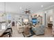 Spacious living room with comfortable seating, a large TV, and plenty of natural light at 330 Compass Point Dr # 101, Bradenton, FL 34209
