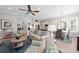 Spacious living area boasts ample natural light and an open layout with a kitchen view at 330 Compass Point Dr # 101, Bradenton, FL 34209